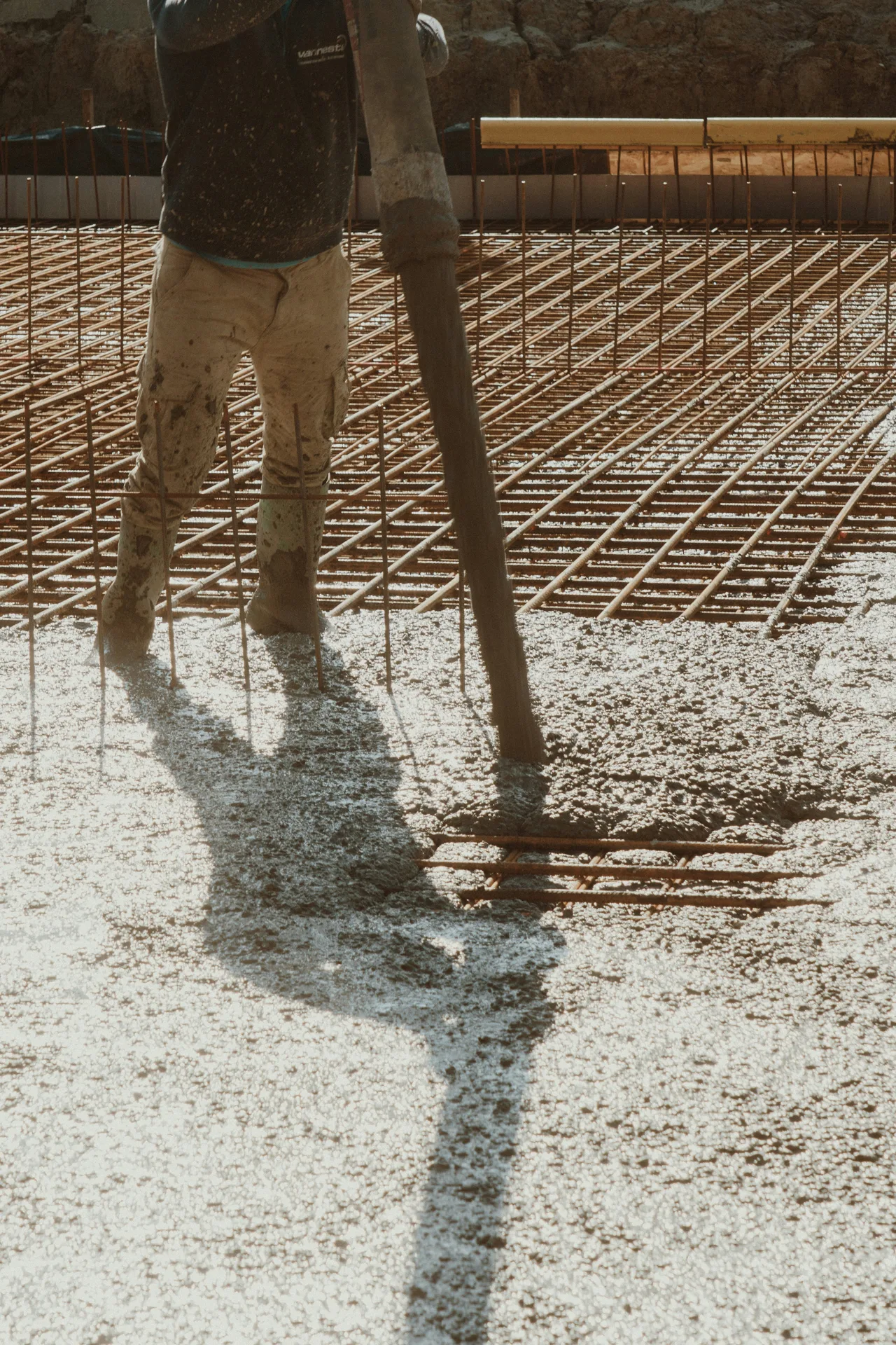 concrete pump hose placing concrete over a Las Vegas rebar mat