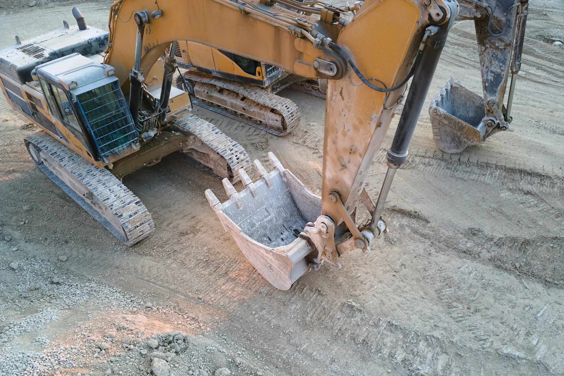 excavator working on a heavy-equipment concrete pad in Las Vegas