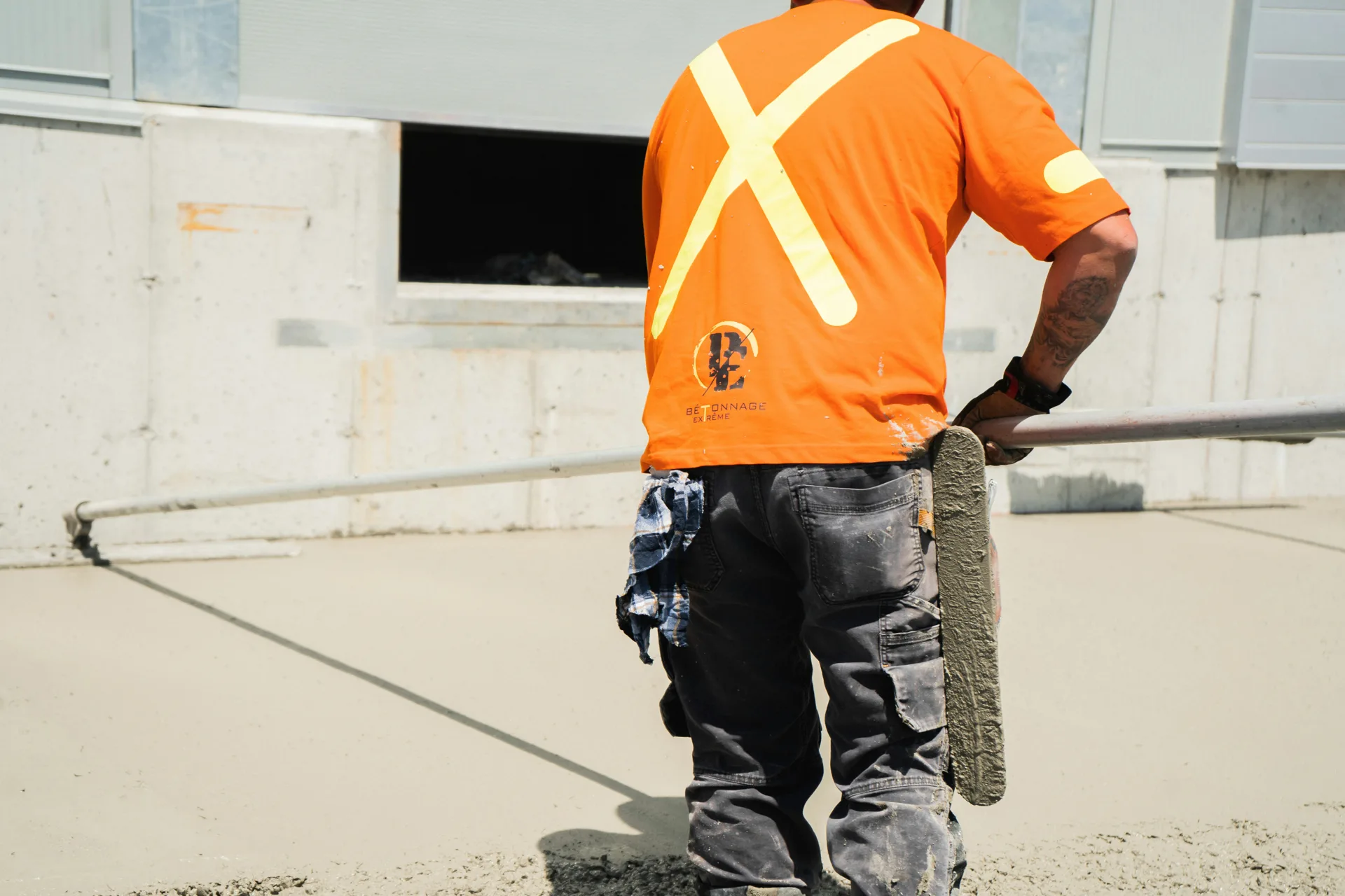 finisher working an Ardex application on a Las Vegas floor