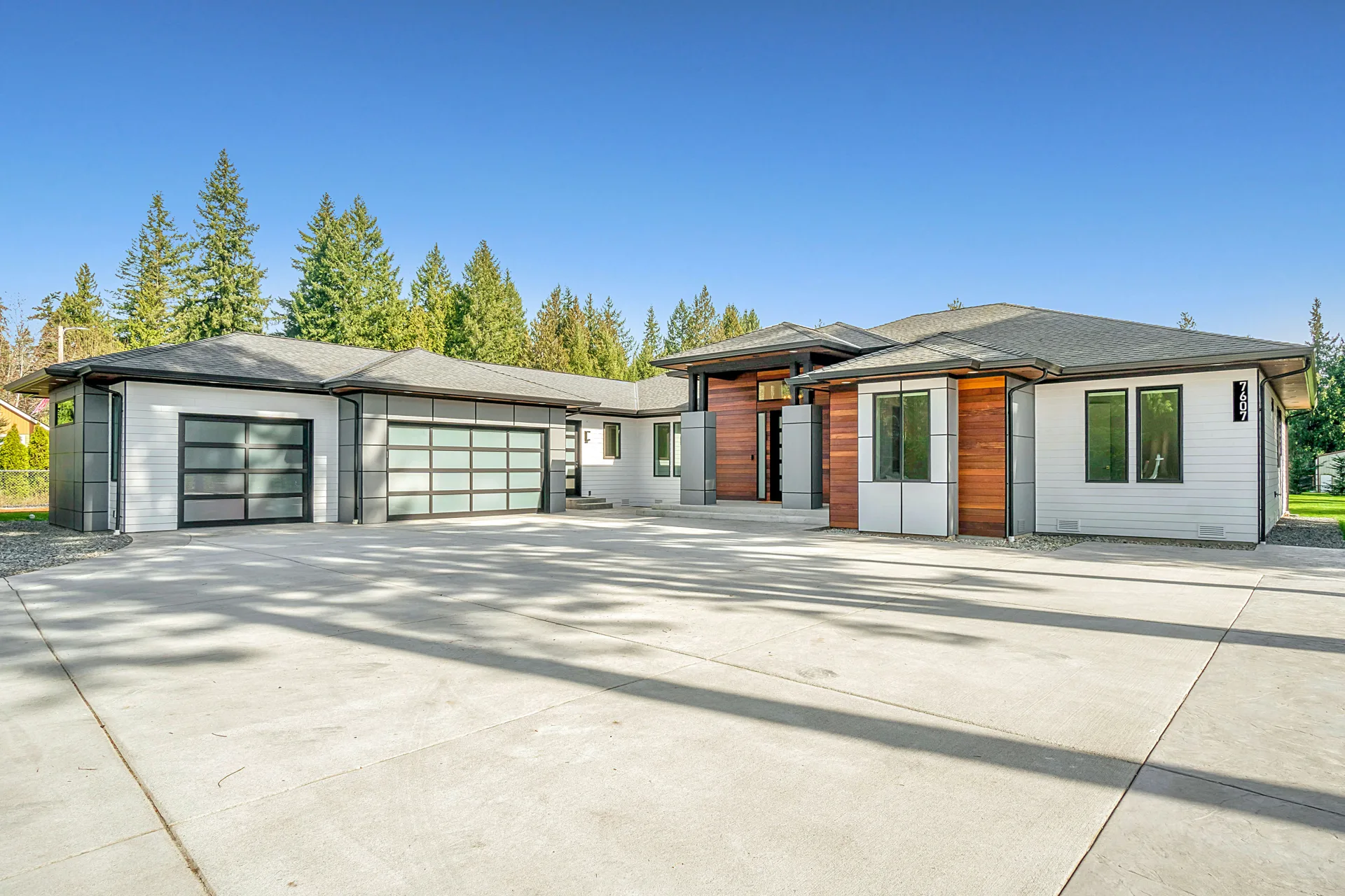 new concrete driveway at a modern three-car-garage Las Vegas home