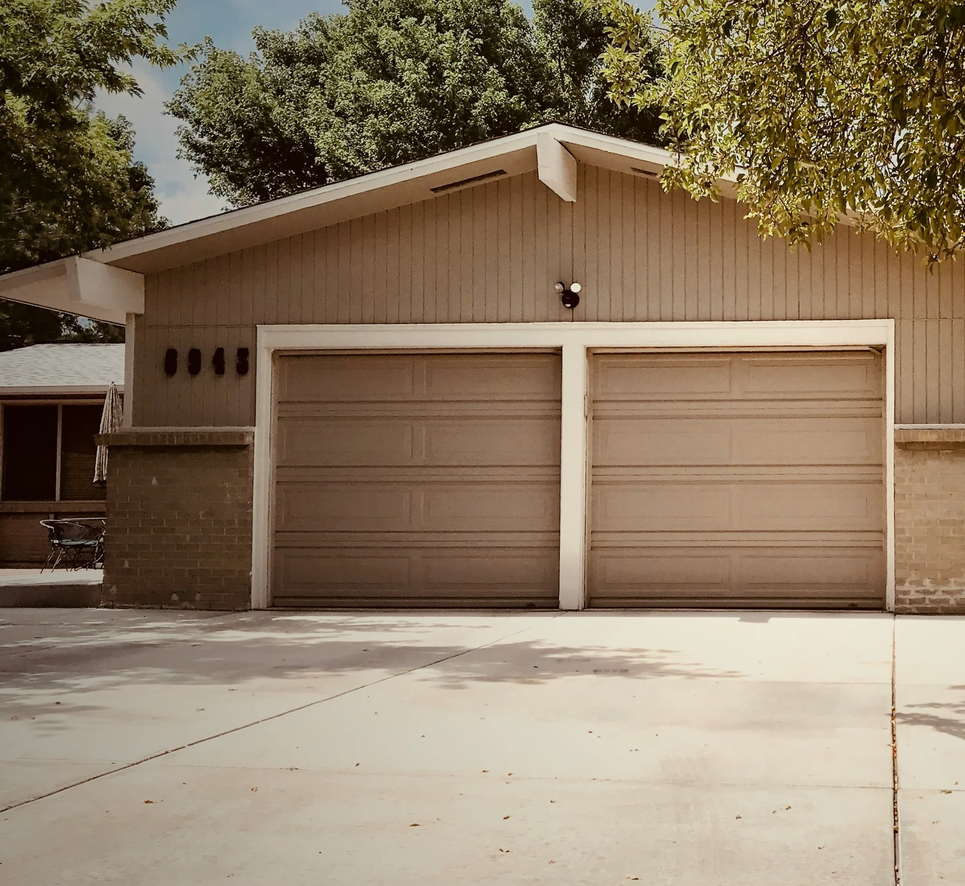 concrete driveway at a ranch home with a double garage in Las Vegas