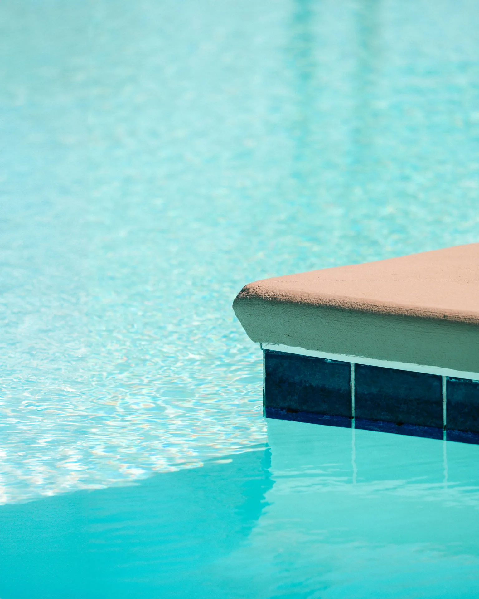 concrete pool step with tile in a Las Vegas pool