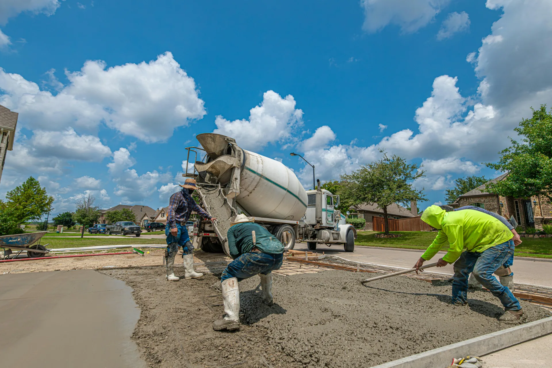 Las Vegas concrete crew finishing a fresh driveway pour